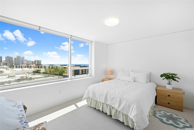 88 Piikoi St Unit 1405, Honolulu, HI 96814 - carpeted bedroom featuring a view of skyline