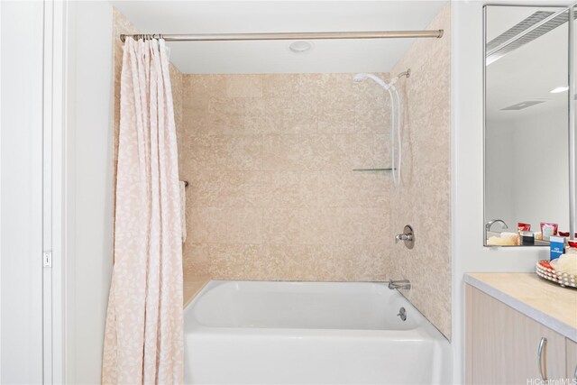 88 Piikoi St Unit 1405, Honolulu, HI 96814 - bathroom featuring shower / tub combo with curtain and vanity