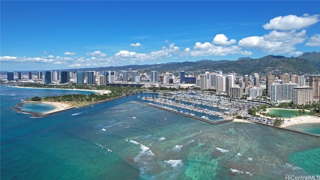 bird's eye view with a water and mountain view