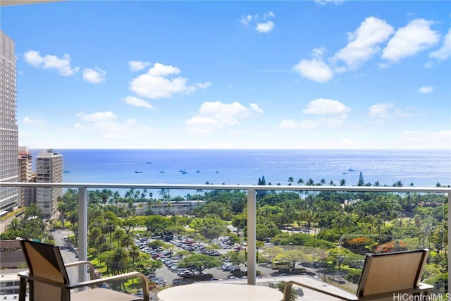 balcony featuring a water view