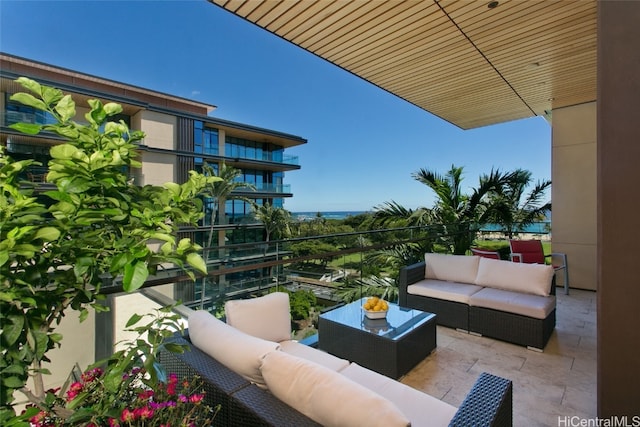 view of patio / terrace with a balcony and an outdoor hangout area