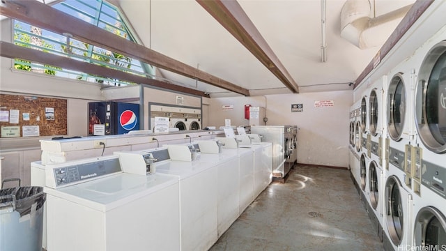 laundry area featuring stacked washer / drying machine and washing machine and clothes dryer