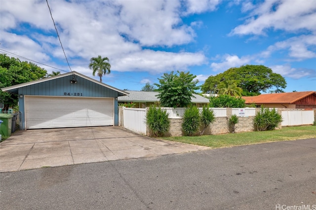 single story home featuring a garage