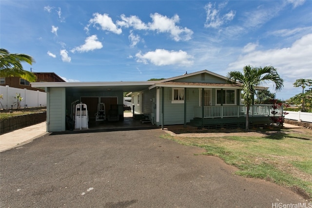 view of front facade with a carport