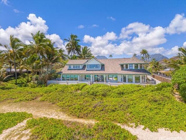 view of front of house featuring a mountain view