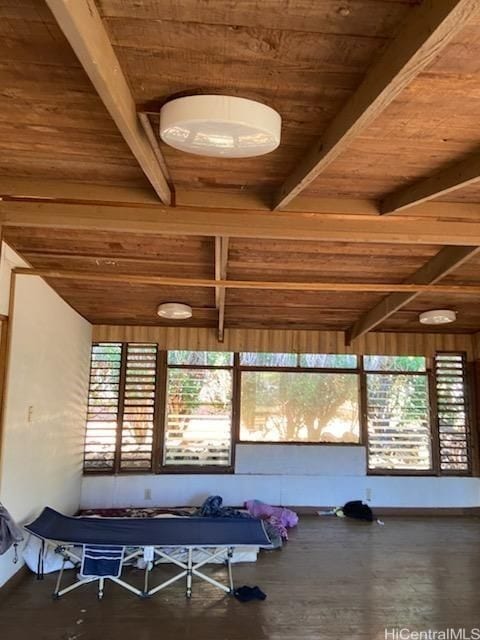 workout room featuring wooden ceiling