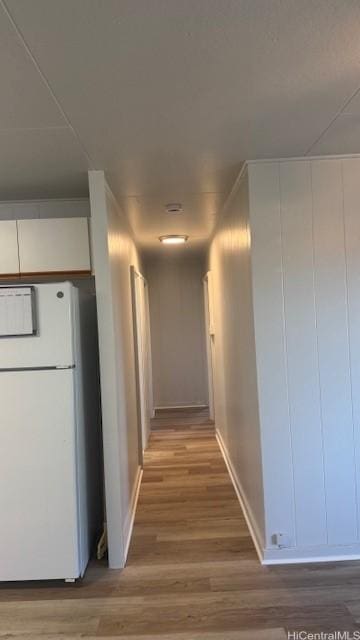 hallway featuring wood-type flooring