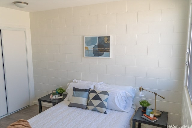 bedroom featuring wood-type flooring