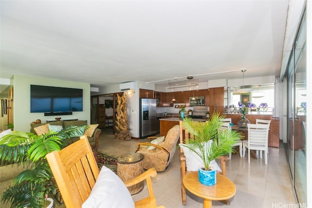 living room featuring a wall unit AC