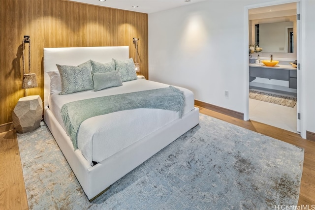 bedroom featuring wood-type flooring