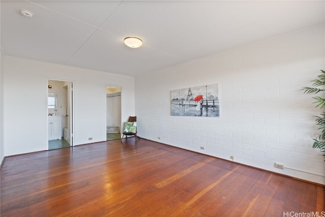 spare room featuring dark hardwood / wood-style floors