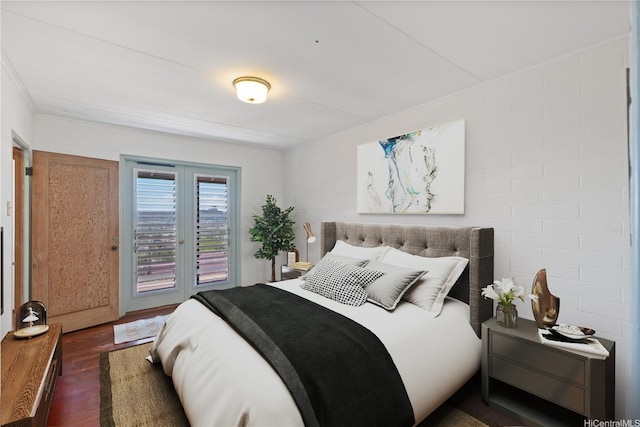 2326 Sonoma St, Honolulu, HI 96822 - bedroom with dark wood-style flooring and access to outside