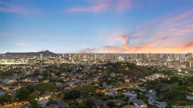 aerial view at dusk with a mountain view