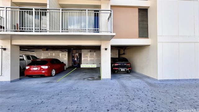 garage featuring a carport