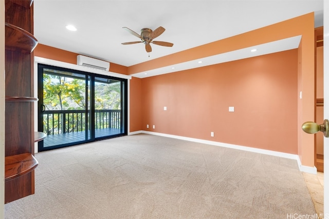 carpeted empty room with a wall mounted AC and ceiling fan