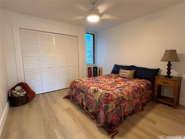 bedroom featuring ceiling fan and light hardwood / wood-style floors