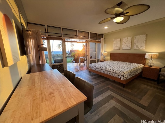 bedroom featuring dark parquet floors, ceiling fan, and access to exterior