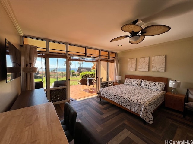 bedroom featuring dark parquet floors, ceiling fan, crown molding, and access to outside