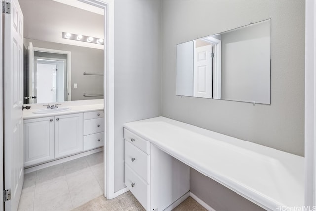 bathroom with vanity and tile patterned floors