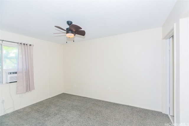 carpeted empty room with ceiling fan and cooling unit