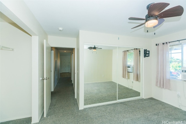 unfurnished bedroom with a closet, ceiling fan, carpet flooring, and cooling unit