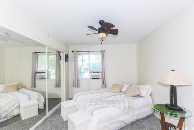 carpeted bedroom featuring a closet, cooling unit, and a ceiling fan