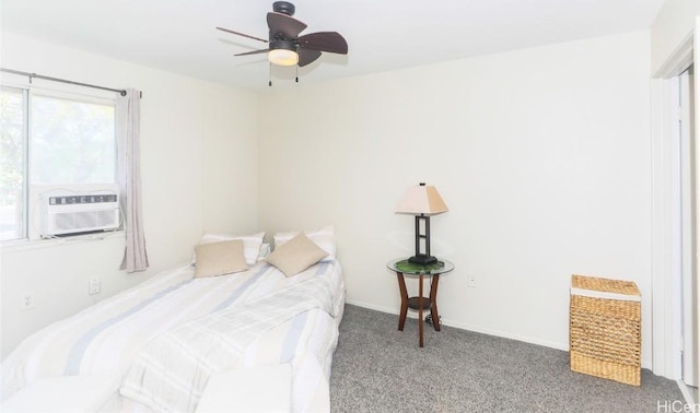 bedroom featuring carpet, ceiling fan, and cooling unit