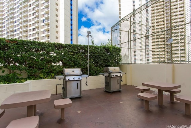 view of patio featuring a grill