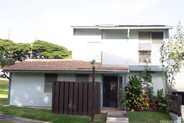 view of front of house with a front lawn