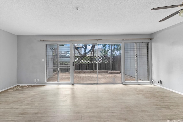 92-988 Panana St Unit 1, Kapolei, HI 96707 - unfurnished room featuring ceiling fan, a textured ceiling, and wood finished floors