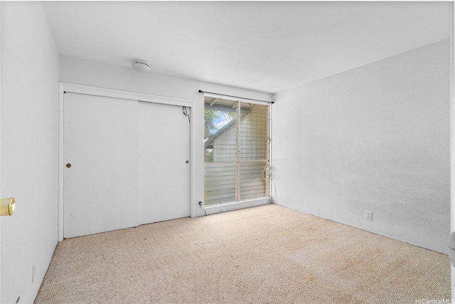 92-988 Panana St Unit 1, Kapolei, HI 96707 - unfurnished bedroom featuring carpet, a closet, and access to exterior