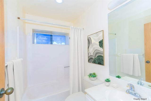 full bathroom featuring shower / bath combination with curtain, toilet, and vanity