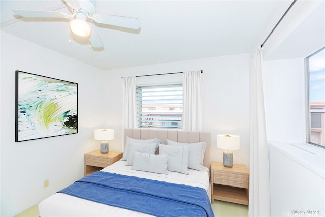 bedroom featuring ceiling fan