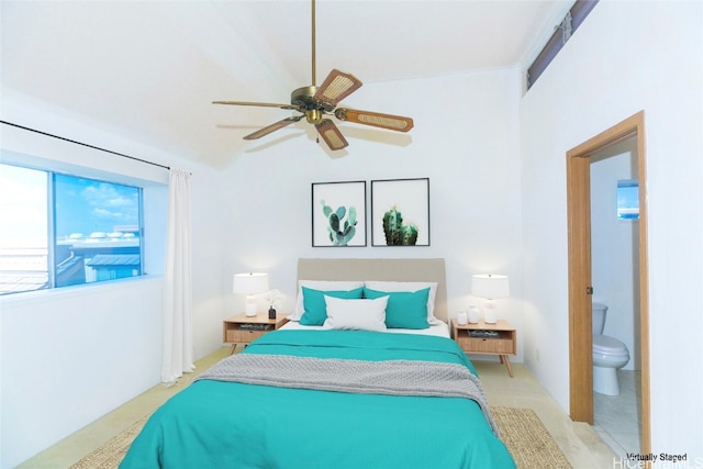 bedroom featuring ensuite bathroom and ceiling fan