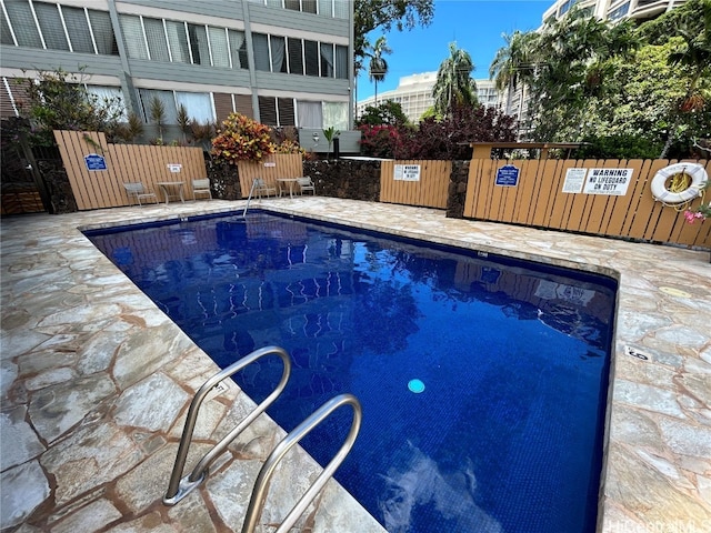 view of pool with a patio