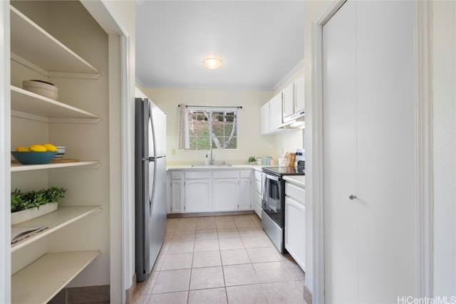 kitchen featuring stainless steel appliances, crown molding, sink, light tile patterned flooring, and white cabinetry