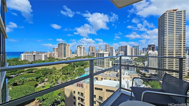 balcony featuring a water view