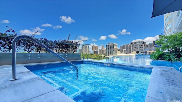 383 Kalaimoku St Unit E2001, Honolulu, HI 96815 - pool featuring a view of city