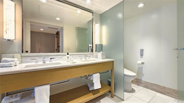383 Kalaimoku St Unit E2001, Honolulu, HI 96815 - bathroom featuring a sink, double vanity, toilet, and tile patterned floors