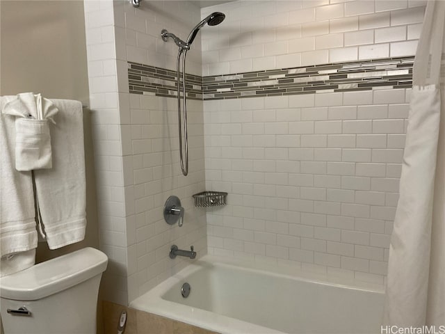 bathroom featuring toilet and shower / bathtub combination with curtain