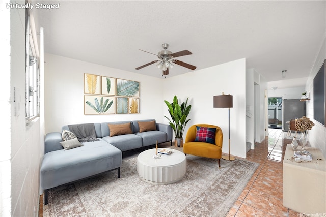 4280 Salt Lake Blvd Unit H11, Honolulu, HI 96818 - living area featuring ceiling fan and light tile patterned floors
