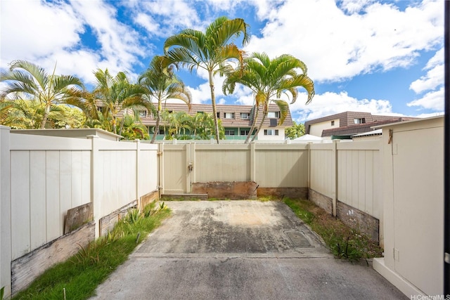 4280 Salt Lake Blvd Unit H11, Honolulu, HI 96818 - fenced backyard with a patio area and a gate