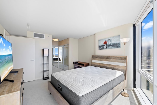 1288 Kapiolani Blvd Unit I1804, Honolulu, HI 96814 - bedroom featuring light colored carpet, baseboards, and a closet