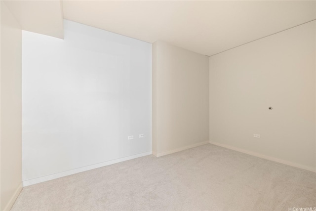 1288 Kapiolani Blvd Unit I1804, Honolulu, HI 96814 - unfurnished room featuring carpet and baseboards