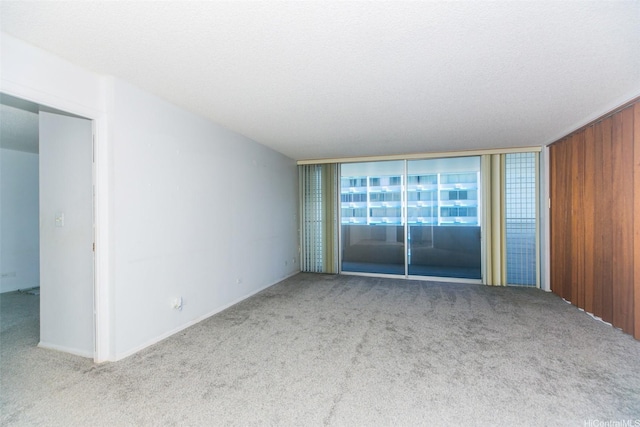 1561 Kanunu St Unit 1205, Honolulu, HI 96814 - carpeted spare room featuring baseboards
