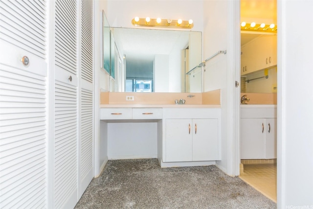 1561 Kanunu St Unit 1205, Honolulu, HI 96814 - bathroom with a closet, vanity, and carpet