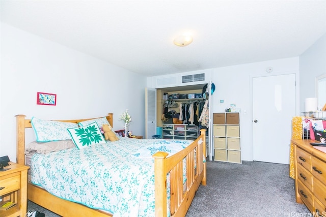 carpeted bedroom with a closet