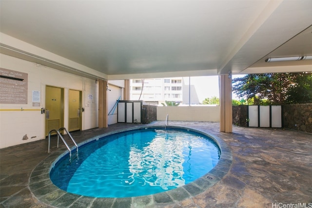 view of pool featuring a patio area