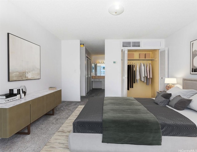 1561 Kanunu St Unit 1205, Honolulu, HI 96814 - bedroom featuring carpet flooring and connected bathroom