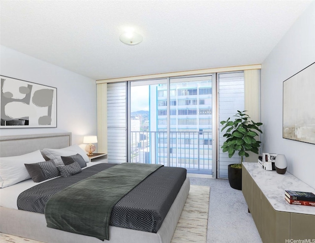 1561 Kanunu St Unit 1205, Honolulu, HI 96814 - bedroom with light carpet, floor to ceiling windows, and access to outside